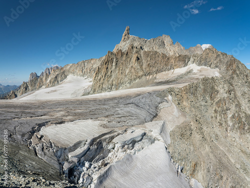 Amazing view to the glaciers of the Mont Blanc range on the Italian side. In the background the Dent du Géant. Wonderful landscape. Summer time