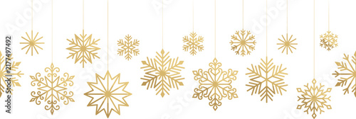 Golden hanging snowflakes border for winter holiday and Christmas celebration design