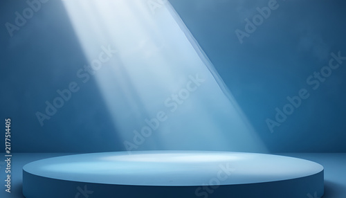 Empty blue product display podium with dramatic spotlight for commercial presentation.