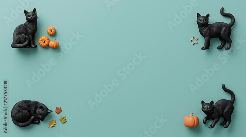 Four black cats and pumpkins halloween flat lay design
