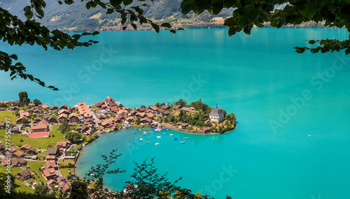 High view over the village of Inseltwald at the turquoise Brienz Lake in Switzerland.