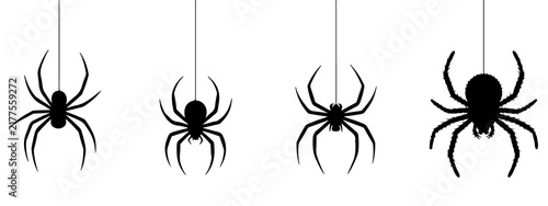 Four black spider silhouettes hanging by thin threads against a white background