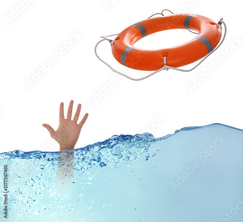 Cuadro en lienzo Man drowning in water trying to catch lifebuoy, closeup