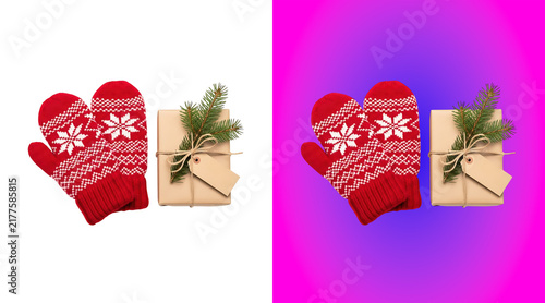 Fotografie Pair of red and white knitted winter mittens with snowflake patterns next to a b