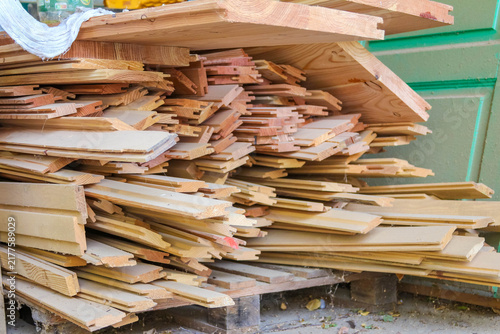 Warsaw, Poland,May 15, 2026. Stacked wooden planks and boards stored on pallets in a woodworking workshop in Warsaw. High quality photograph