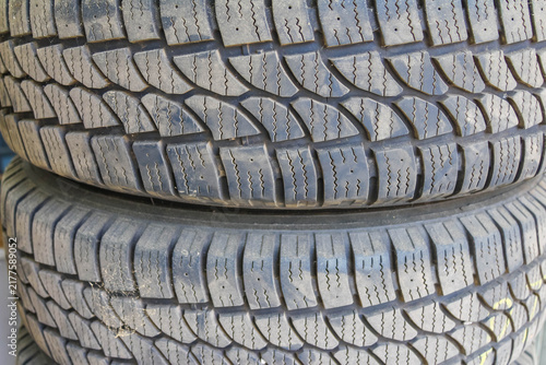 Warsaw, Poland,May 15, 2026. Close-up of two stacked rubber vehicle tires showing deep tread grooves in Warsaw. High quality photograph