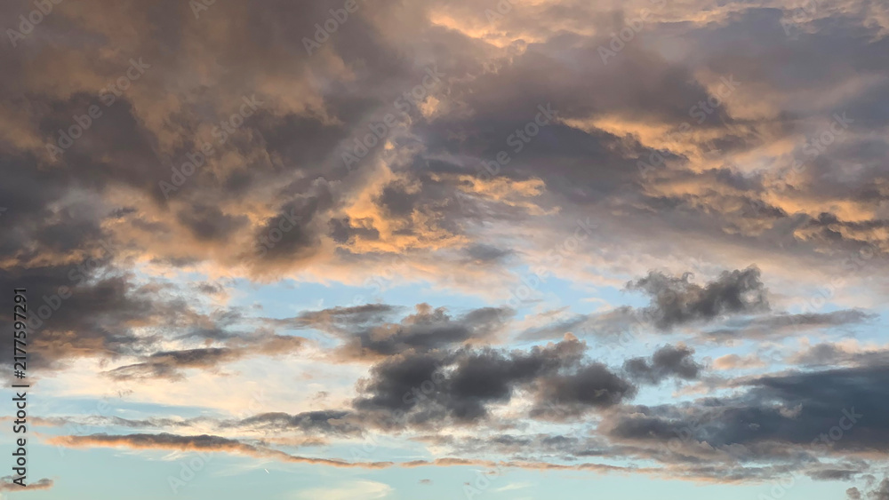 Obraz premium storm clouds in the evening sunset