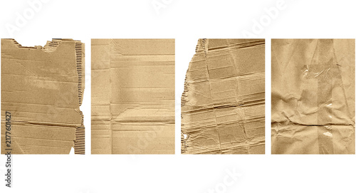 Obraz na plátne Four pieces of old torn brown paper sheets with rough edges and wrinkled texture