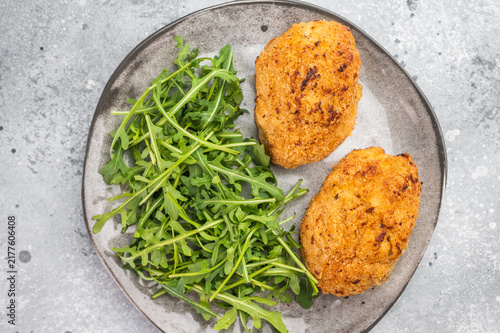 Obraz na plátně Chicken Kiev traditional breaded chicken cutlet stuffed chicken with butter fill