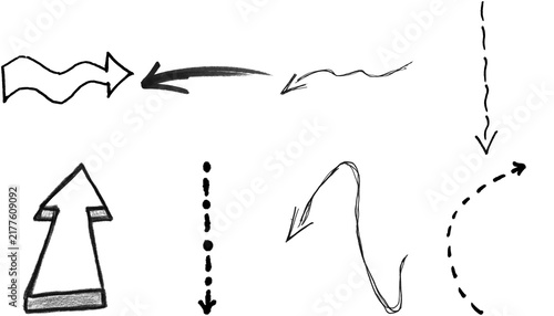 Set of hand drawn arrow shapes and sketch pointer symbols for design elements in black ink style on a simple page