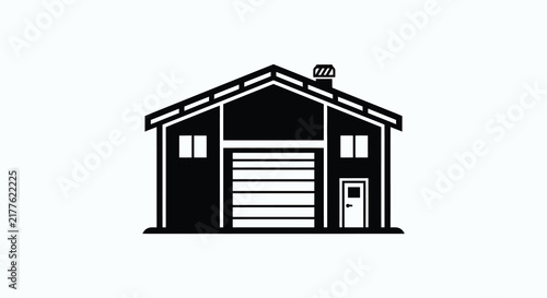Black silhouette of a house with garage and chimney on white background