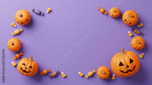 Orange Halloween pumpkins and candy corn arranged as a frame on a purple background