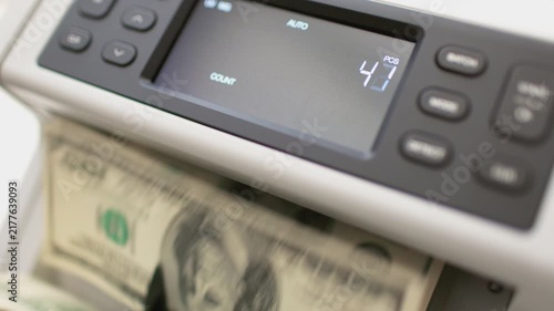Automatic Money Counter Processing One Hundred US Dollar Bills Accurately