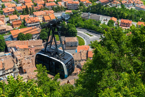 Cable car cabin riding from Borgo Maggiore village to the historic center of San Marino on Mount Titano
