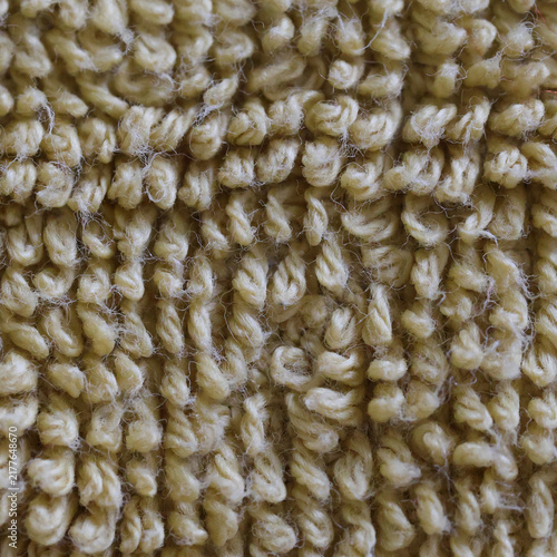 Close up of light yellow textile 