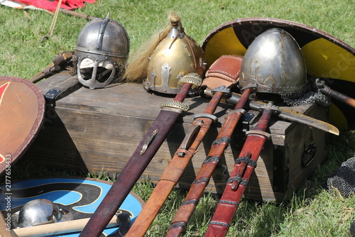 Konstfotografi Medieval Swords Helmets and Shields Displayed on Wooden Chest Reenactment