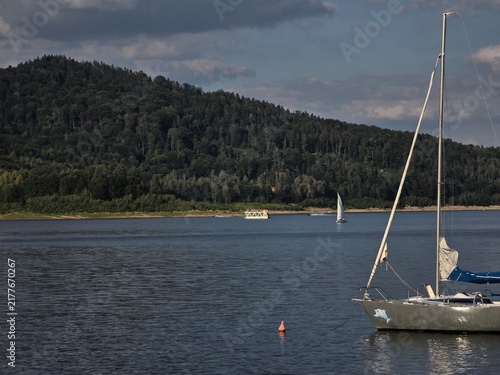Bild auf Leinwand boats on the lake