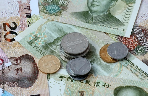 Photography Chinese yuan money banknotes and coins on table