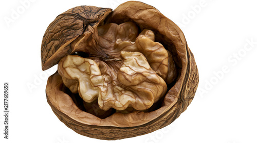 Konstfotografi Isolated raw healthy walnut cracked open to reveal the entire edible kernel inside