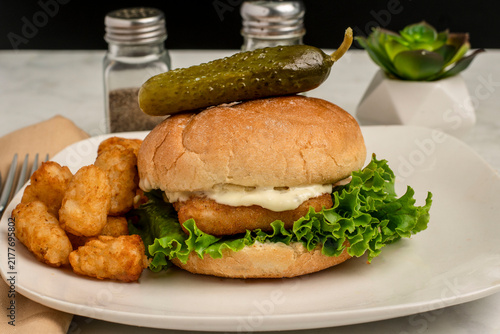 Canvastavla haddock   fillet sandwich  with a  pickle