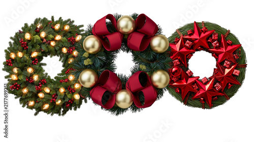 Konstfotografi Isolated three distinctive Christmas wreaths adorned with lights, bows, golden b
