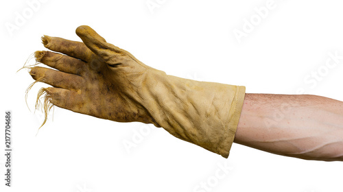 Foto Isolated person's arm wearing a worn-out, dirty, and frayed fabric work glove fo