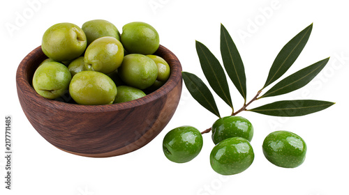 Bild auf Leinwand Isolated fresh green olives in a rustic wooden bowl with a small olive branch and berries