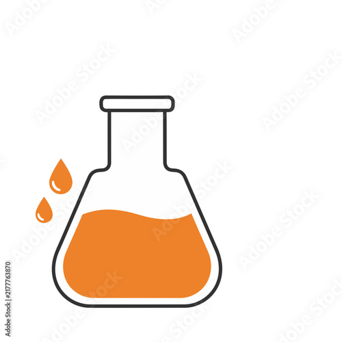 Laboratory flask with orange liquid and drops