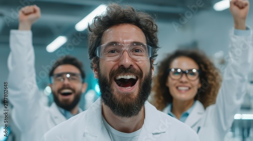 Excited Team of Diverse Scientists Celebrating Successful Scientific Breakthrough in Modern Laboratory