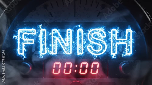 Neon blue 'FINISH' sign with electrical sparks above a red digital timer showing '00:00' on a dark, metallic background, symbolizing completion.
