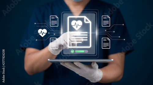 Digital healthcare record system concept with medical documents, heartbeat monitoring, and connected patient data technology