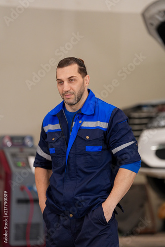 Canvas Print Technician mechanic garage uniform vehicle repair workshop maintenance man autom