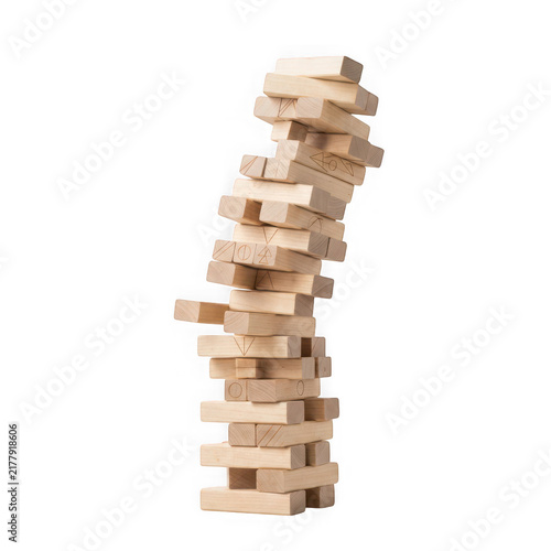 A precarious tower of wooden blocks with etched symbols isolated on transparent background