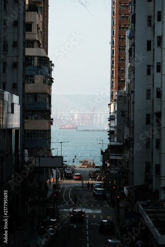 Hong Kong Kennedy Town streets and harbor view at dusk