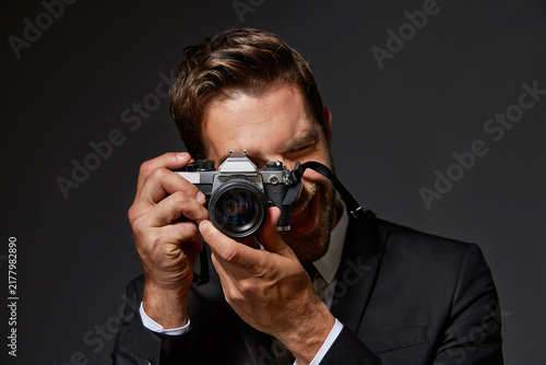 Bild auf Leinwand Shooting, photography and portrait of man in studio for event photoshoot pov, lens and artist