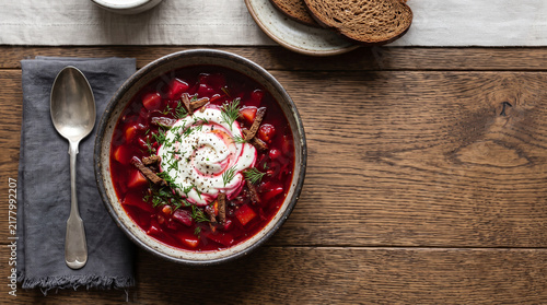 Ukrainian soup dish: Borscht soup on a table seen from above with copy space, ad image traditional East European food