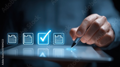 Hand using stylus to select checkmark on digital tablet screen