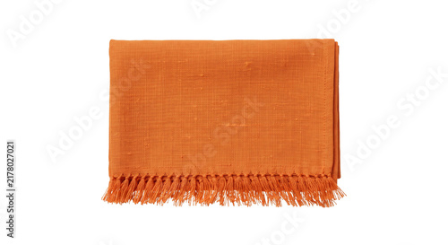 Obraz na plátně Folded orange textile with fringe detail on a white background