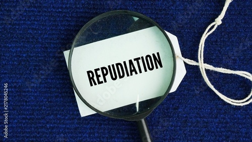 Konstfotografi Magnifying glass and paper tag with the word Repudiation is the formal act of rejecting, disowning, or refusing to accept something as true, valid, or binding