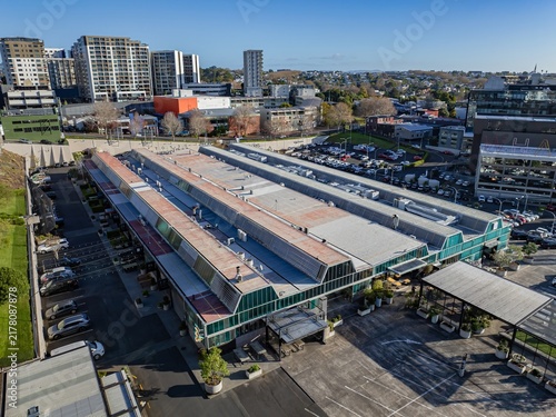 Quadro su tela Aerial view of City Works Depot, a bustling commercial and dining precinct featuring restaurants and offices in Auckland, New Zealand