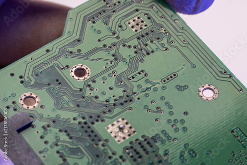 Fotografie Detailed macro photography of green printed circuit board traces and vias demonstrating complex electronic engineering