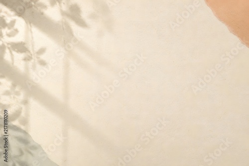 Natural light paper texture backdrop with soft window shadow