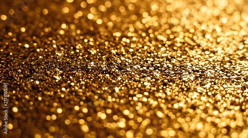 Golden glitter abstract background with sparkling bokeh particles abstract background particles