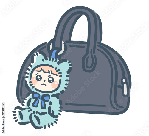 A plushie keychain attached to a bag.