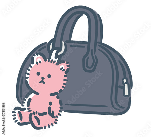 A plushie keychain attached to a bag.
