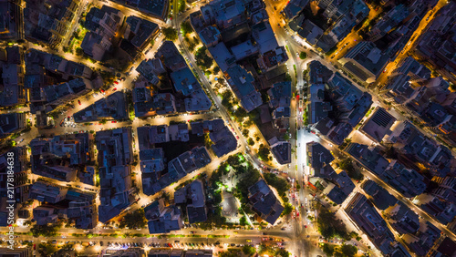 Top down aerial view of an urban road at night