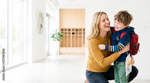 Mother picking up son after extracurricular activity at school