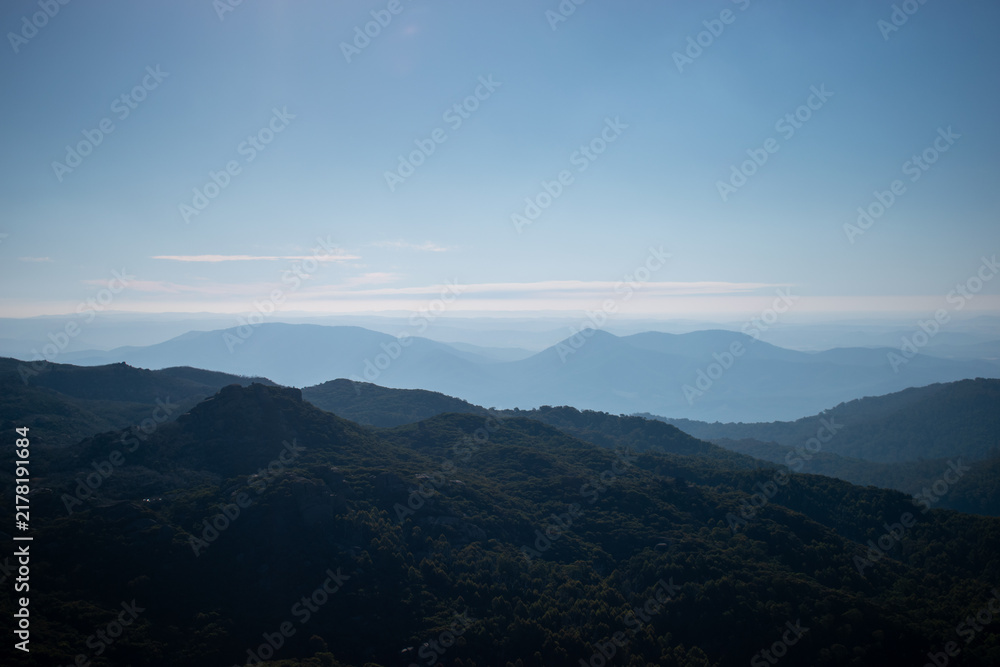Obraz premium Australia, The Cathedral and The Hump are two famous granite rock formations connected by a popular 1.9-kilometer (1.2-mile) walking track in Mount Buffalo National Park in Victoria.