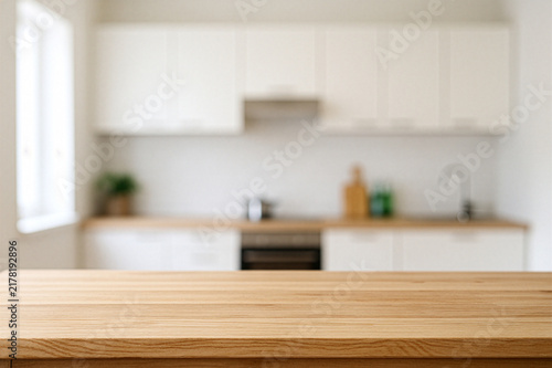 wooden top table with blurry kitchen set background