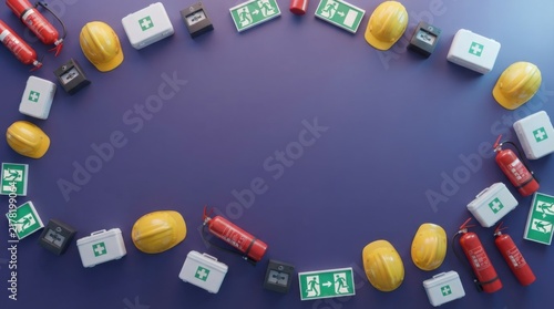 Construction safety gear and first aid kits arranged in a circle
